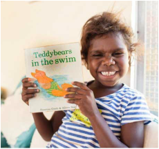 Picture of Indigenous child reading book