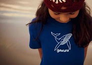 girl wearing blue eora sydney whale bamboo tee shirt